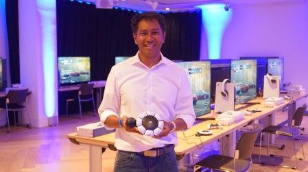 Image of Alvin Daniel, SIE Senior Program Technical Manager, holding an access controller