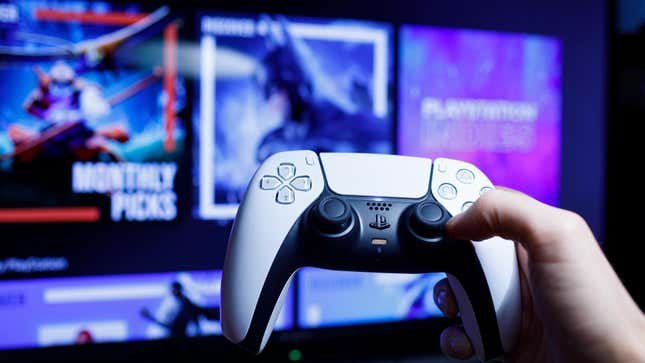 Man holding PS5 DualSense