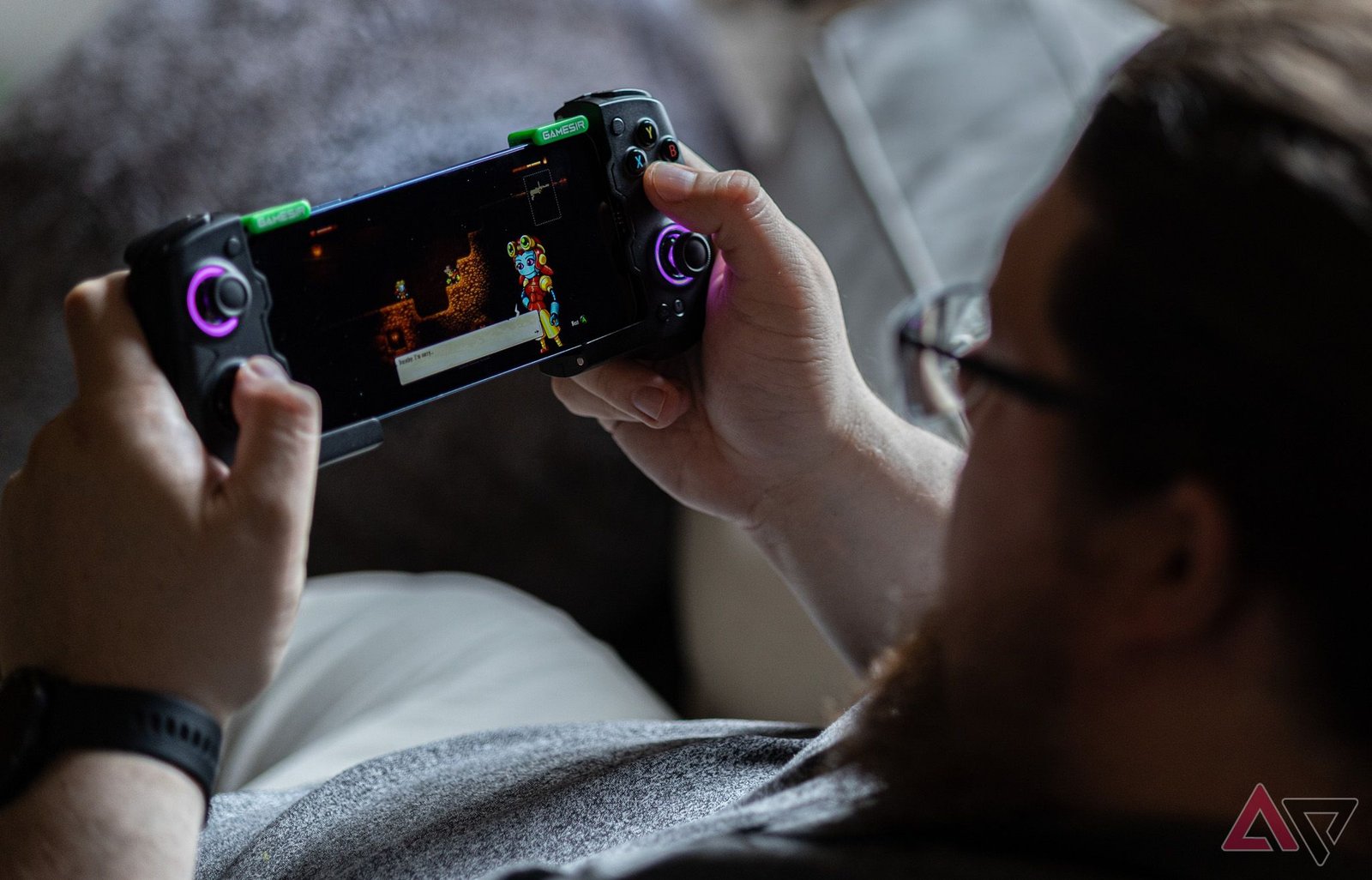 Top view of a person playing on the GameSir X4 Aileron controller