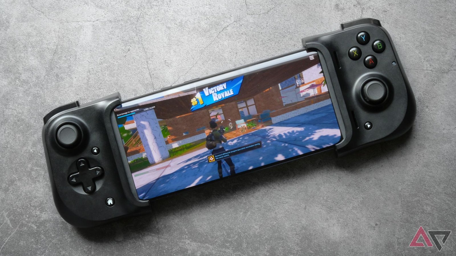 Fortnite runs on a OnePlus phone with a Razer Kishi controller attached.