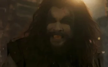 Jason Momoa as Lobo, featuring white skin and long black hair, looking menacing in the new Supergirl teaser trailer