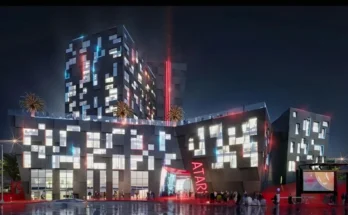 Renderings of the proposed Atari Hotel in Phoenix, featuring the iconic Fuji logo and neon lighting.