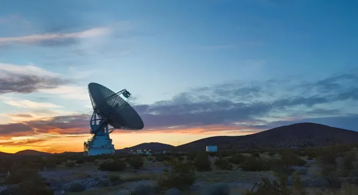 The 230-foot DSS-14 radio antenna at NASA's Goldstone Deep Space Communications Complex in the Mojave Desert.